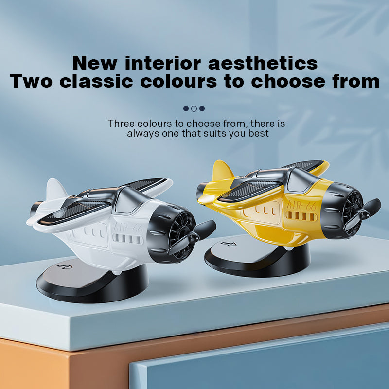 Solar powered airplane shaped car ornaments