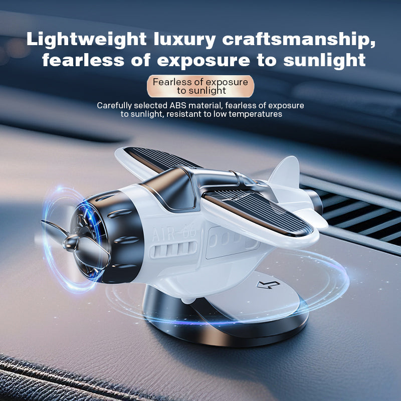 Solar powered airplane shaped car ornaments